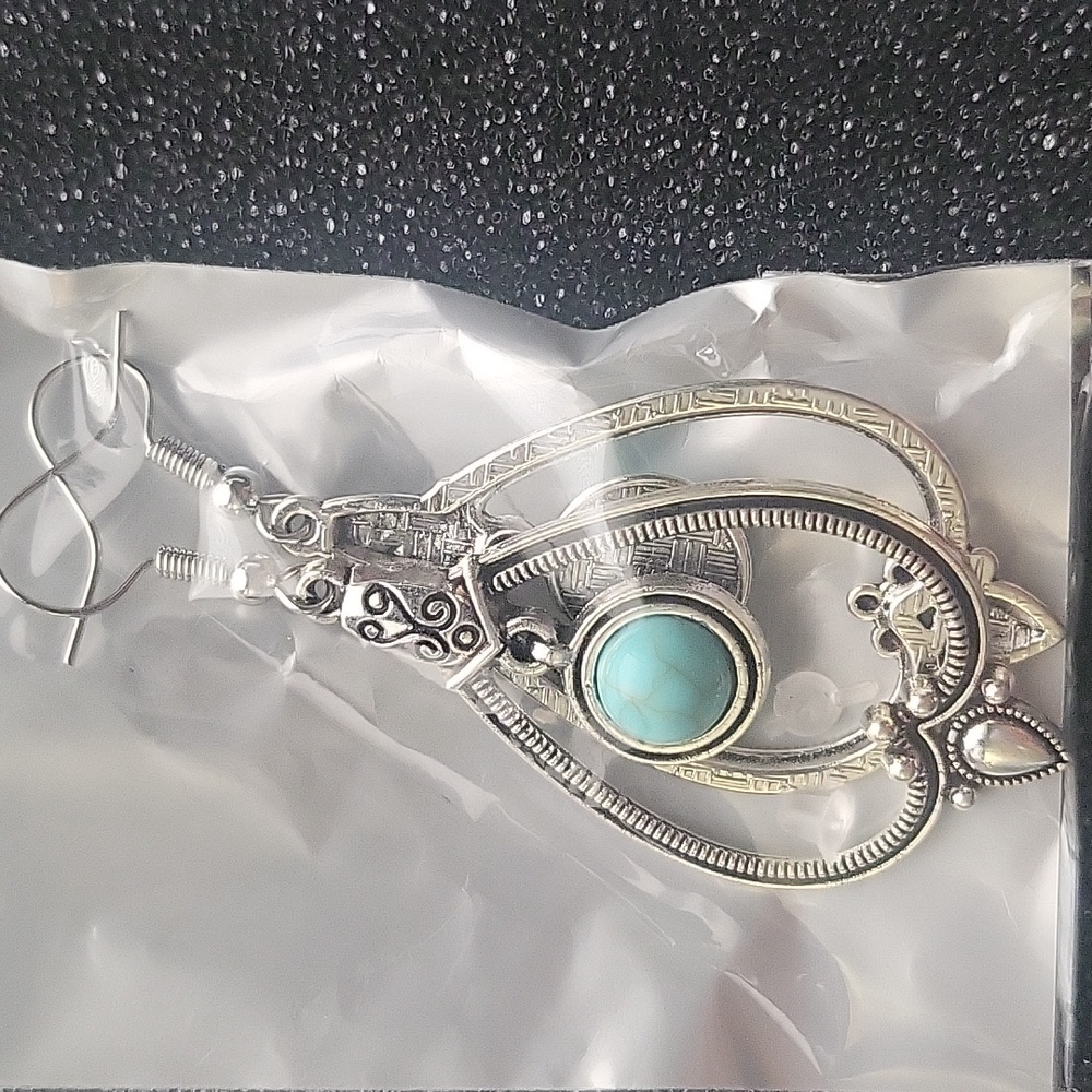 Silver turquoise dangle earrings.